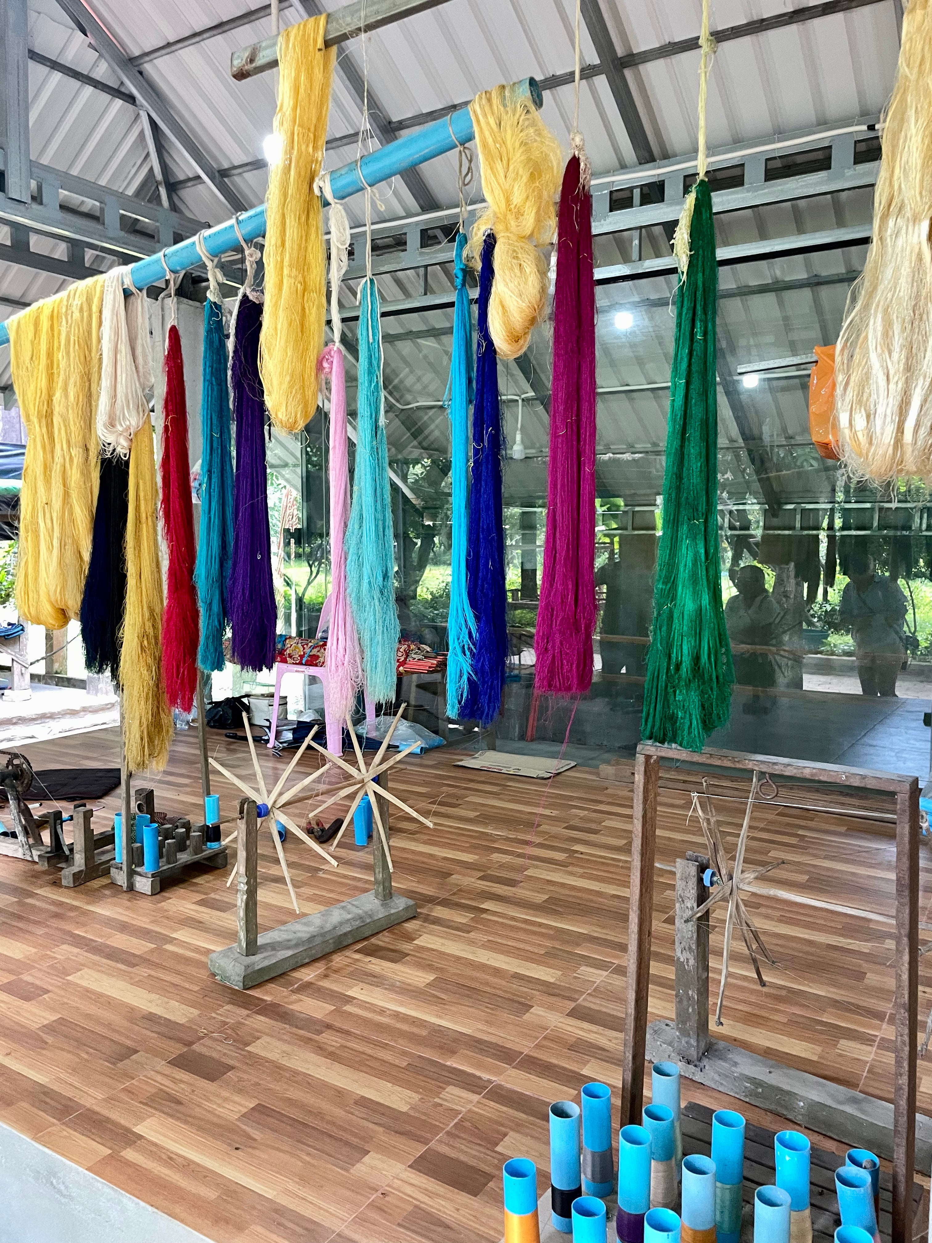Woven silk hanging to dry